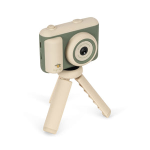 Toy camera with a tripod on a white background