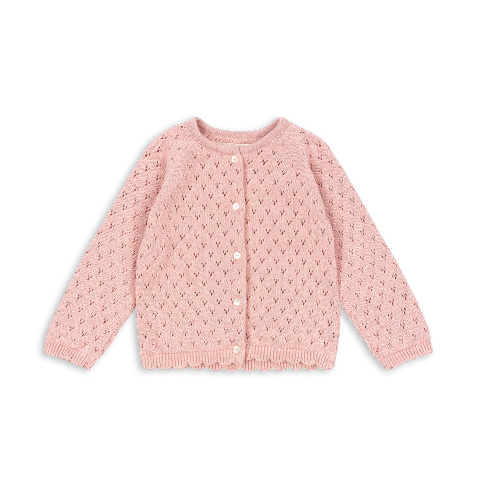 Pink textured cardigan on a white background