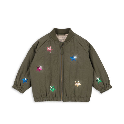 Green jacket with colorful star patterns on a white background
