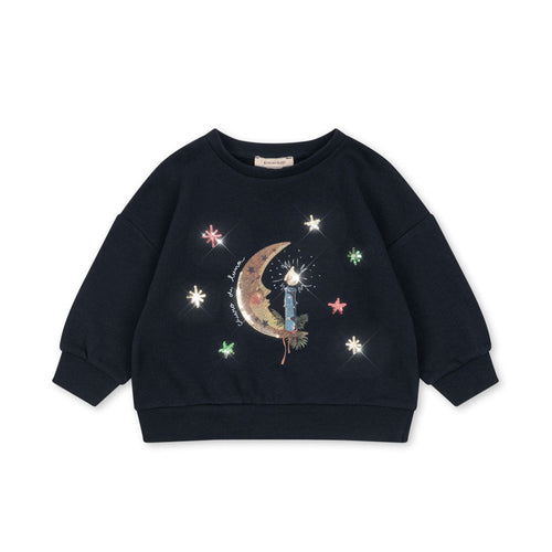Navy blue sweatshirt with celestial design on a white background
