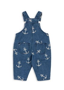 Blue denim overalls with anchor pattern on a white background