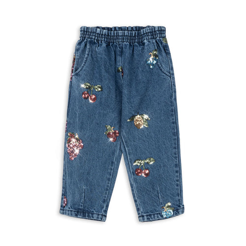 Blue jeans with fruit embroidery on a white background