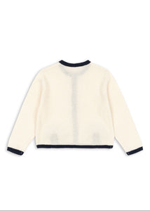 White sweater with black trim on a white background