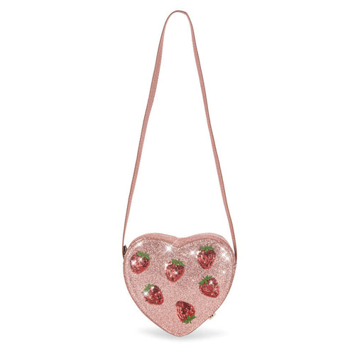Heart-shaped pink purse with strawberry designs on a white background