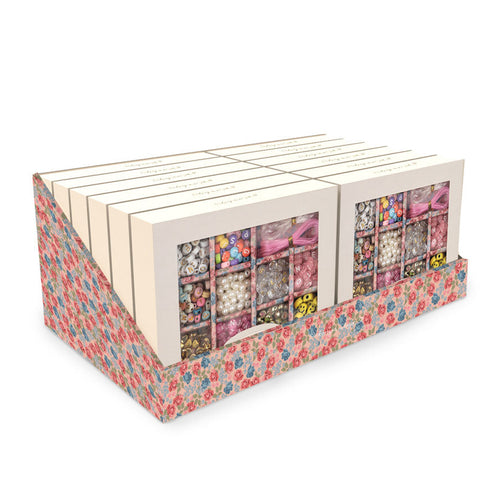 Floral-patterned box with a window displaying colorful items on a white background