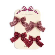 將圖片載入圖庫檢視器 Set of red glittery hair bows on a beige card with a pink ribbon against a white background