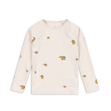 Load image into Gallery viewer, White long-sleeve shirt with small yellow patterns on a white background