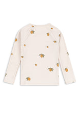 Load image into Gallery viewer, White long-sleeve shirt with fruit pattern on a white background