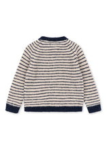 Load image into Gallery viewer, A striped knit sweater shown from the back, featuring horizontal stripes in cream and navy blue with solid navy ribbed trim at the collar, cuffs, and hem.