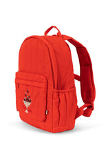 Load image into Gallery viewer, Red backpack with a small design on the pocket against a white background