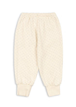 Load image into Gallery viewer, Cream-colored baby pants on a white background