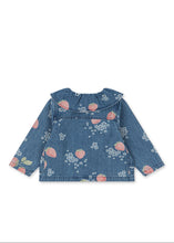 Load image into Gallery viewer, Back view of a denim jacket with floral pattern on a white background