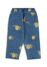 Load image into Gallery viewer, Blue jeans with yellow lemon patterns on a white background
