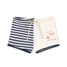 將圖片載入圖庫檢視器 Navy striped shorts and white towel with text on a white background