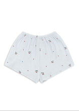 將圖片載入圖庫檢視器 White shorts with small red and blue patterns on a white background