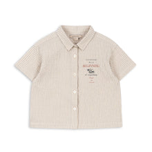 將圖片載入圖庫檢視器 Beige striped shirt with text on a white background