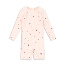 Load image into Gallery viewer, Baby and toddler Merle swim onesie by Konges Sløjd in cherry coeur rose with pink and red floral pattern, front view.