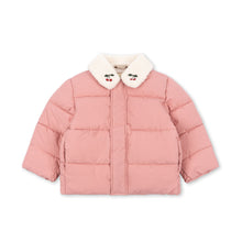Load image into Gallery viewer, A pink puffer jacket with a white faux-fur collar featuring embroidered cartoon faces, shown against a plain white background.