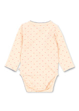 Load image into Gallery viewer, A long-sleeve baby bodysuit in a pale peach color, featuring a small repeating pattern of tiny red hearts and finished with gray scalloped trim on the cuffs and neckline.