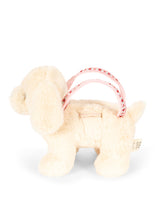 Load image into Gallery viewer, A cream-colored plush dog toy with a pink patterned strap handle, shown on a solid white background.