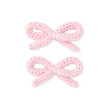 Load image into Gallery viewer, Two pink knitted bows on a white background