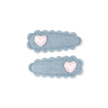 Load image into Gallery viewer, Two blue hair clips with pink hearts on a white background